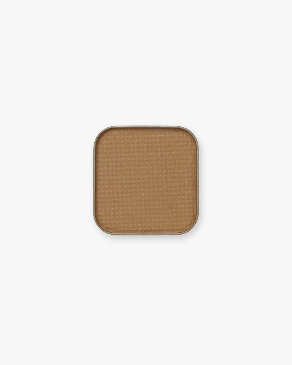 Warm caramel-tan Seint Pressed Pigment in Cowboy, pictured in its square metal tin