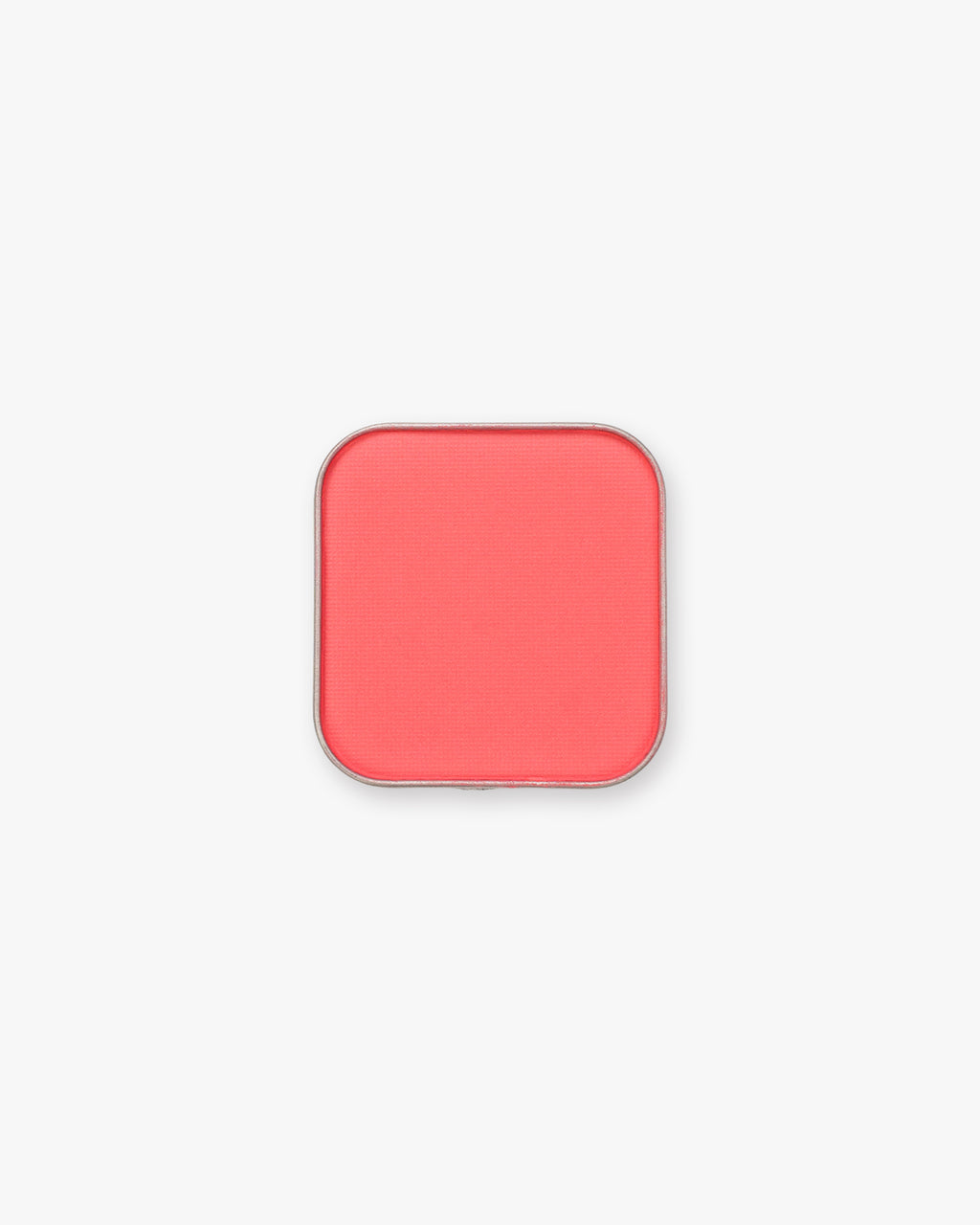 Seint Pressed Pigment in Guava glows watermelon pink in its rounded square tin