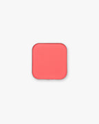 Seint Pressed Pigment in Guava glows watermelon pink in its rounded square tin