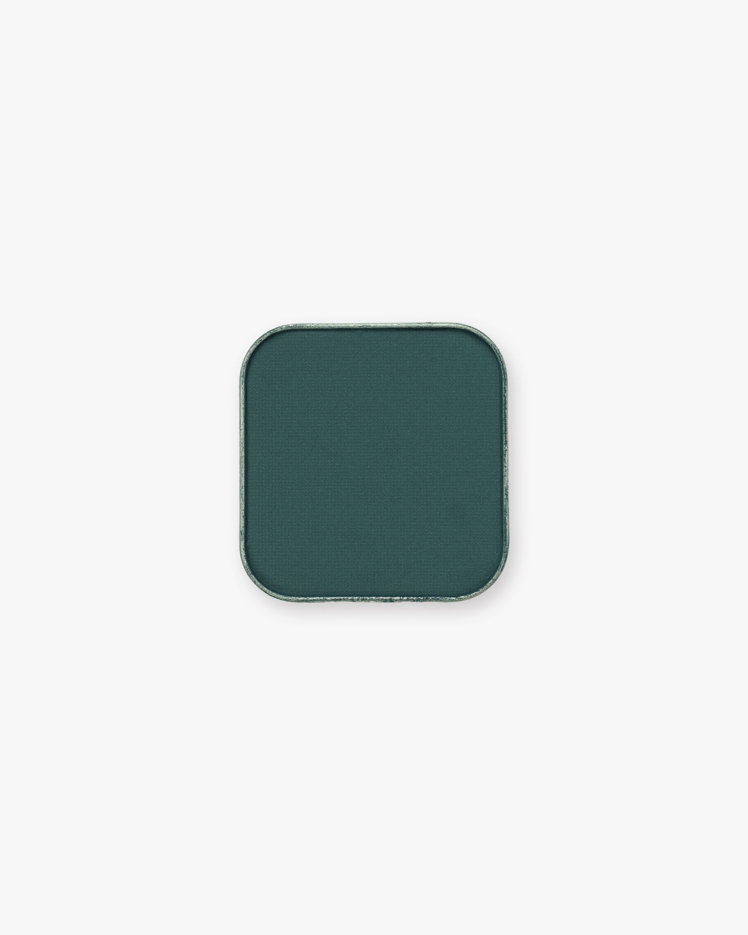 Deep teal-green Seint Pressed Pigment in Juniper, shown in its square metal pan