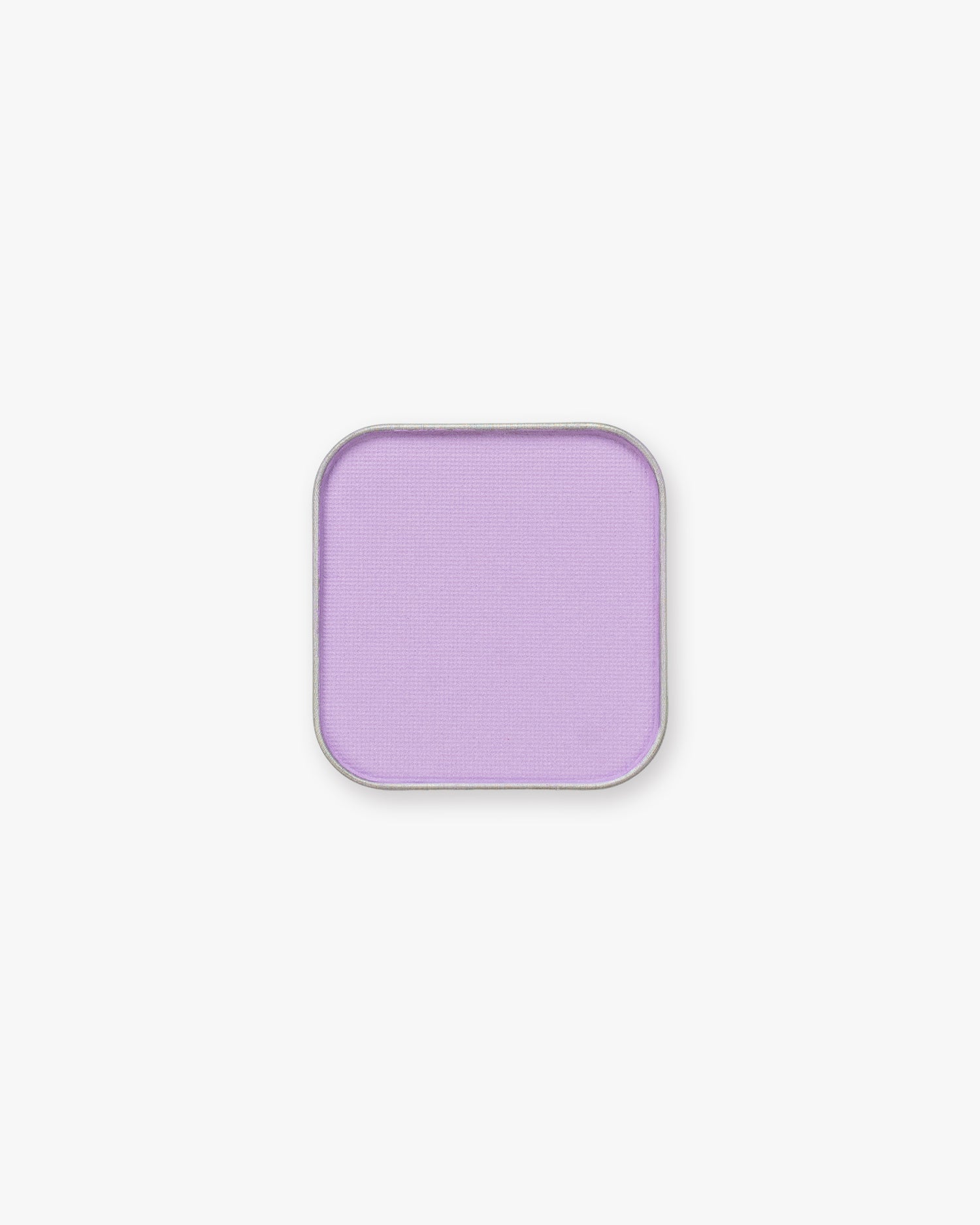 Seint Pressed Pigment in Lilac fills its metal pan with soft pastel-lavender color