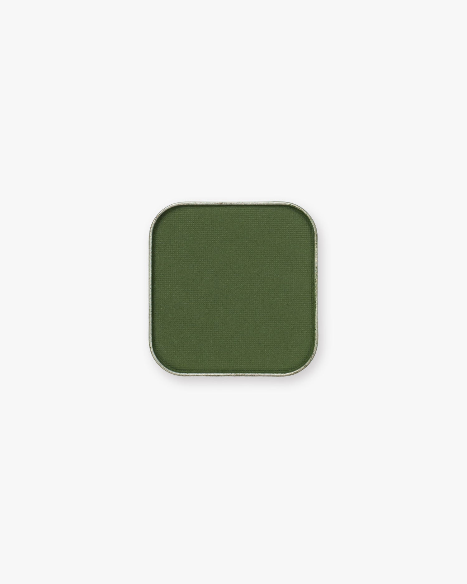Seint Pressed Pigment in Lucky fills its metal pan with deep olive-green matte color