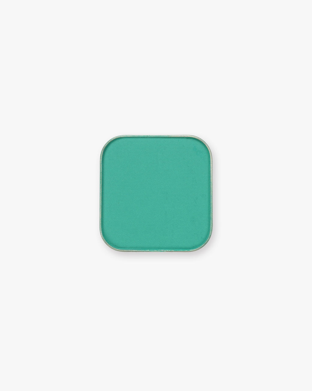 Seint Pressed Pigment in Maldives, a bright turquoise-jade matte powder in a metal pan