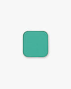 Seint Pressed Pigment in Maldives, a bright turquoise-jade matte powder in a metal pan
