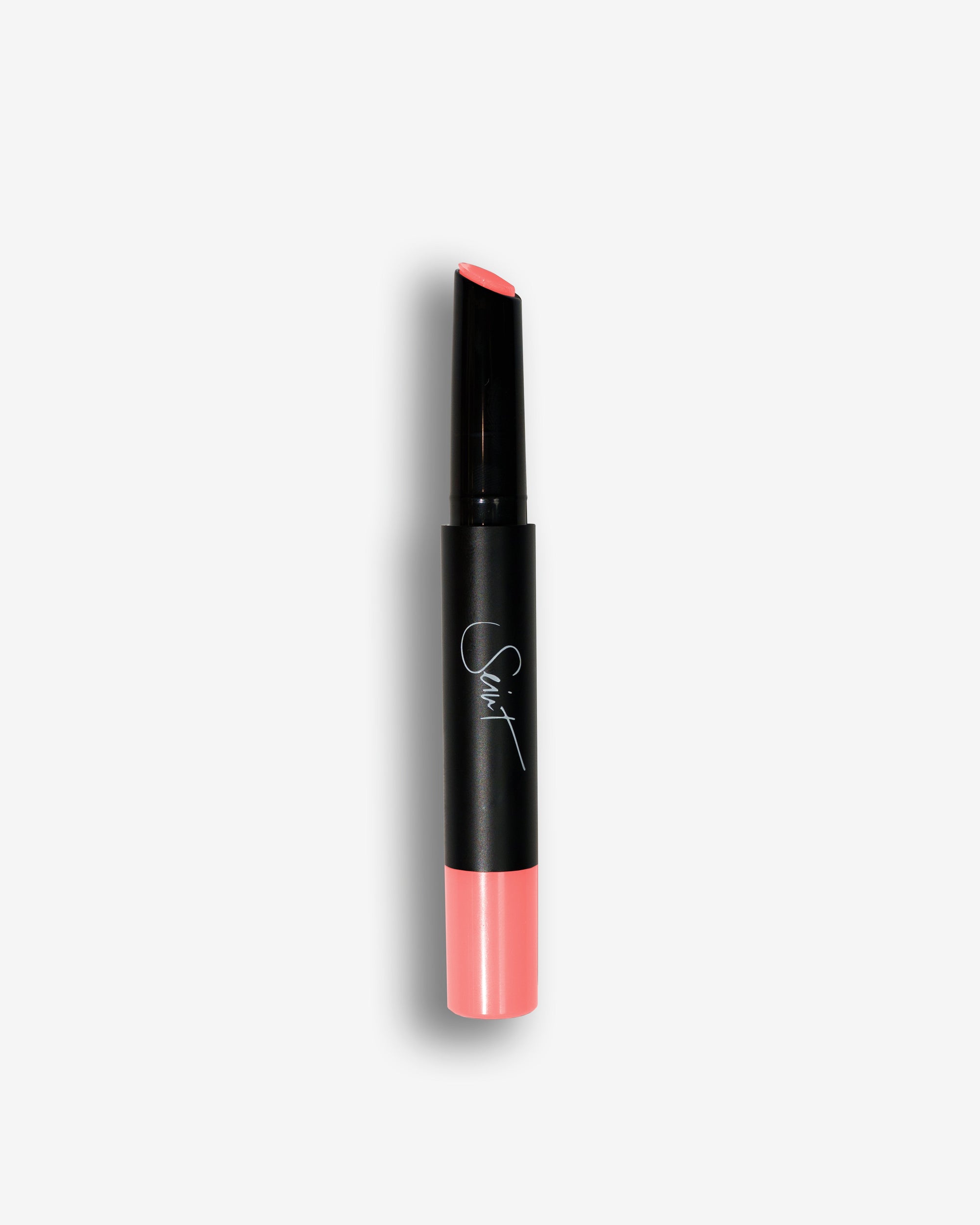 Seint Lip Gelato in Strawberry, slim black tube with angled tip and soft coral-pink cream at the base
