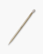 Seint Spot Brush in rose gold with a fluffy tapered blending head on one end and a fine pointed detail tip on the other