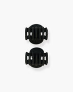 Seint The Hair Clip set of two closed matte black claw clips viewed from above with rounded oval tops