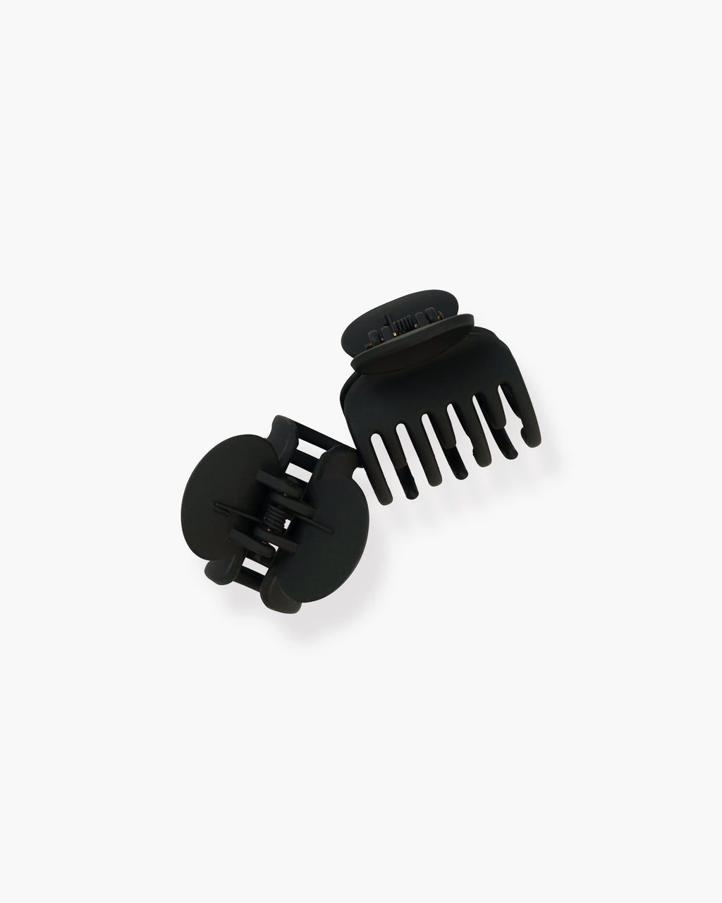 Seint The Hair Clip pair angled together, one clip open to show curved teeth and its spring hinge