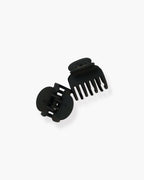 Seint The Hair Clip pair angled together, one clip open to show curved teeth and its spring hinge