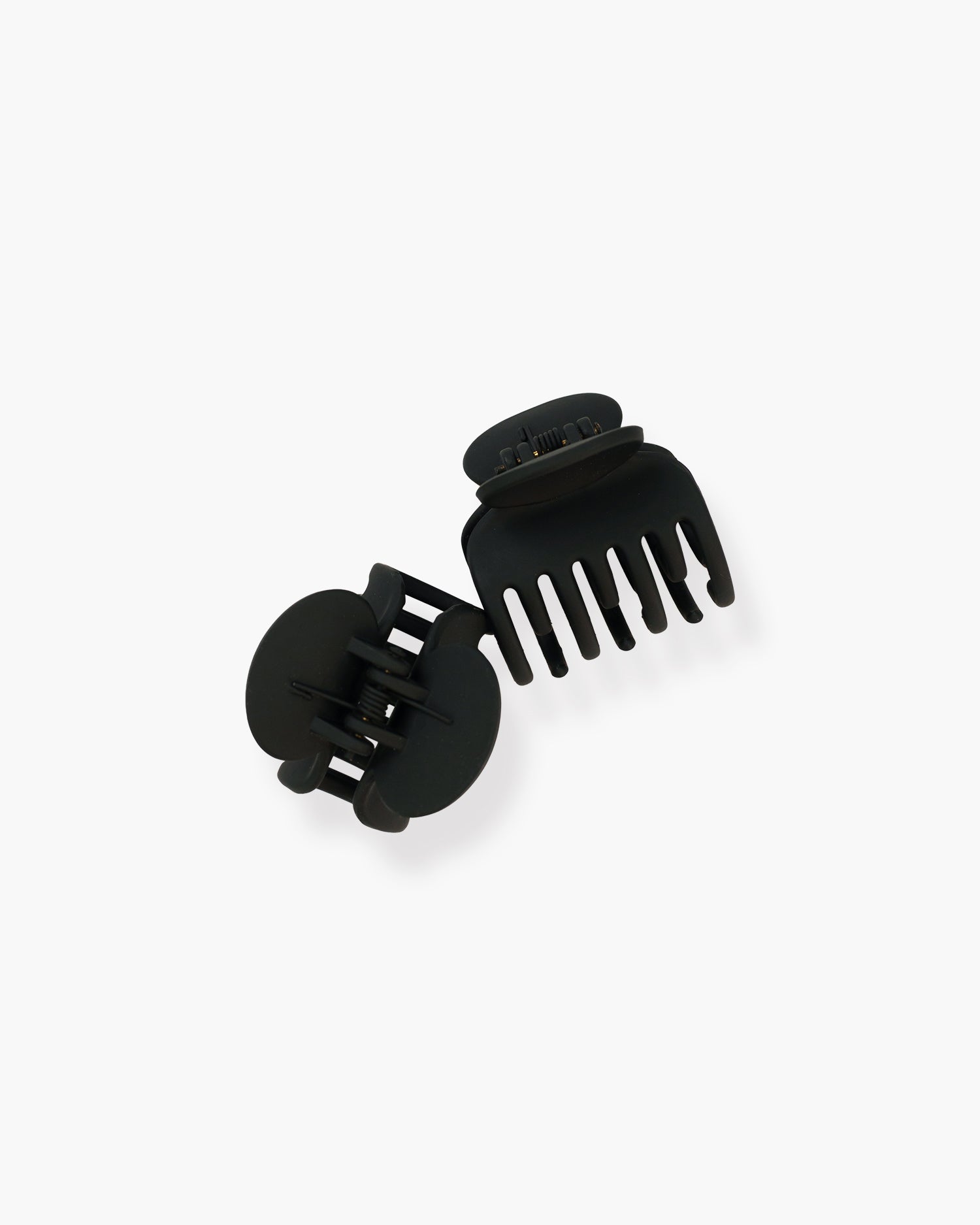Seint The Hair Clip pair angled together, one clip open to show curved teeth and its spring hinge