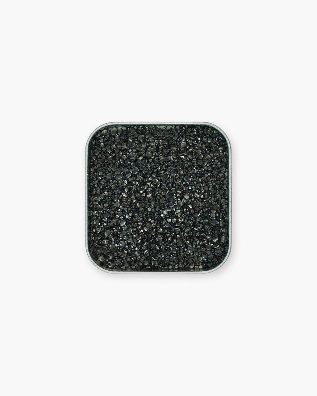 Seint 1/2 Brush Cleaning Tile overhead view, the compact square tin holding a black honeycomb-textured sponge