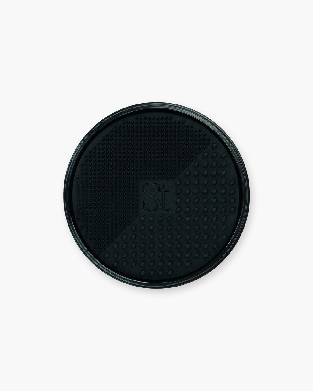 Seint Brush Cleansing Soap silicone lid detail: black scrubbing pad with raised dot texture for deep-cleaning brushes