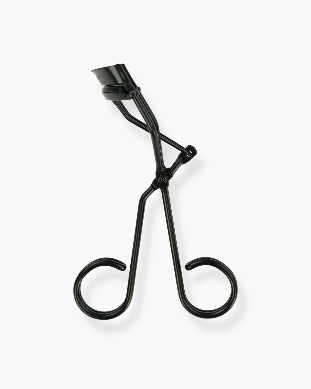 Seint Lash Curler, Halfmoon style — upright view of the all-black tool showing its rounded pad and open scissor frame