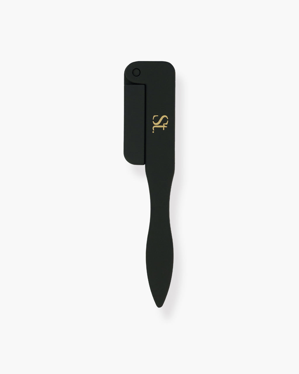 Seint Lash Comb folded closed — matte black retractable handle with gold logo, comb teeth tucked away