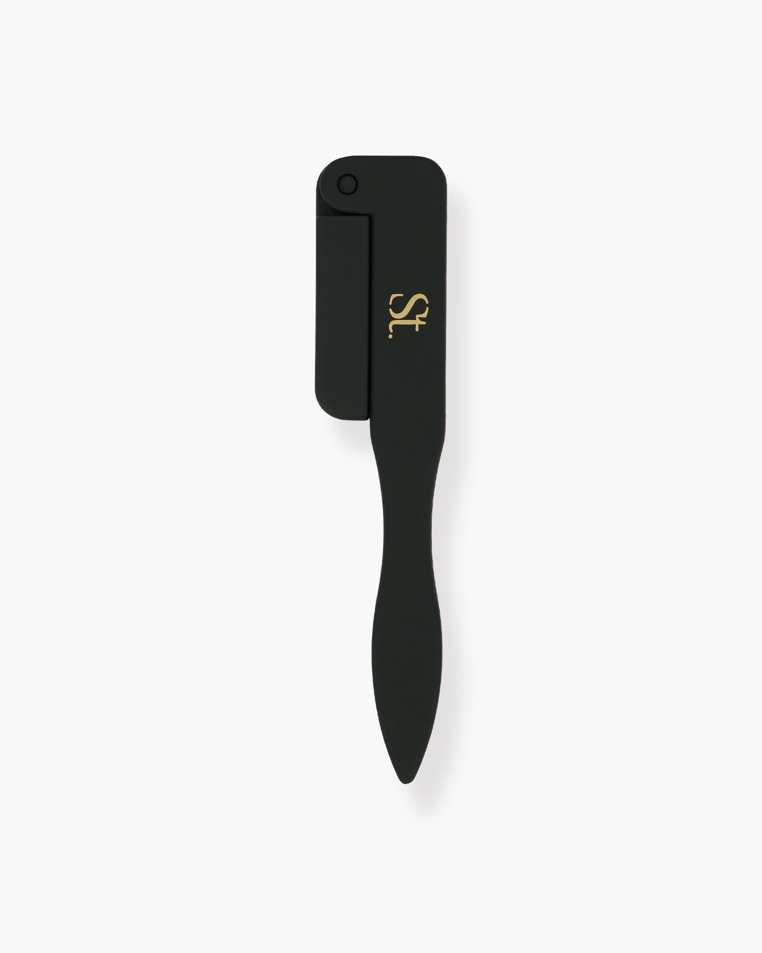 Seint Lash Comb folded closed — matte black retractable handle with gold logo, comb teeth tucked away