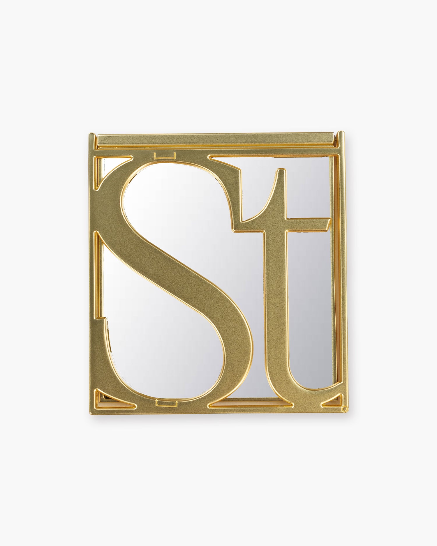 Seint Mercury Compact Mirror closed, gold frame with the sculpted Seint serif monogram over the square mirror