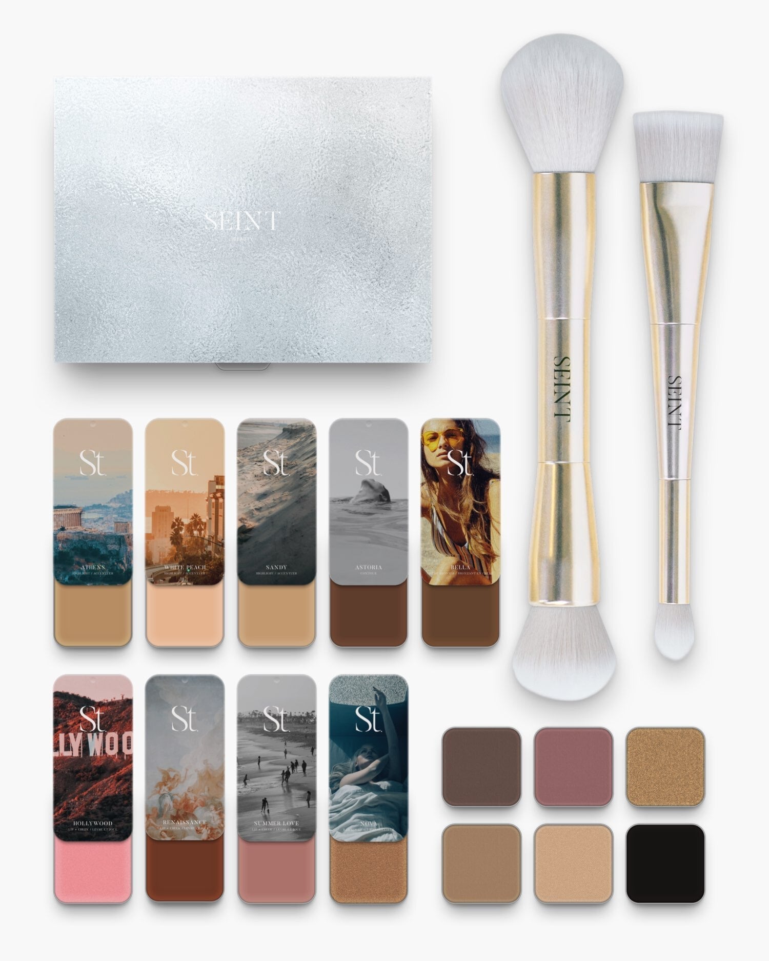 Seint No. 12 Collection Level III: light-medium tan creams and rosy blush tins beside the silver box, brushes and six pans
