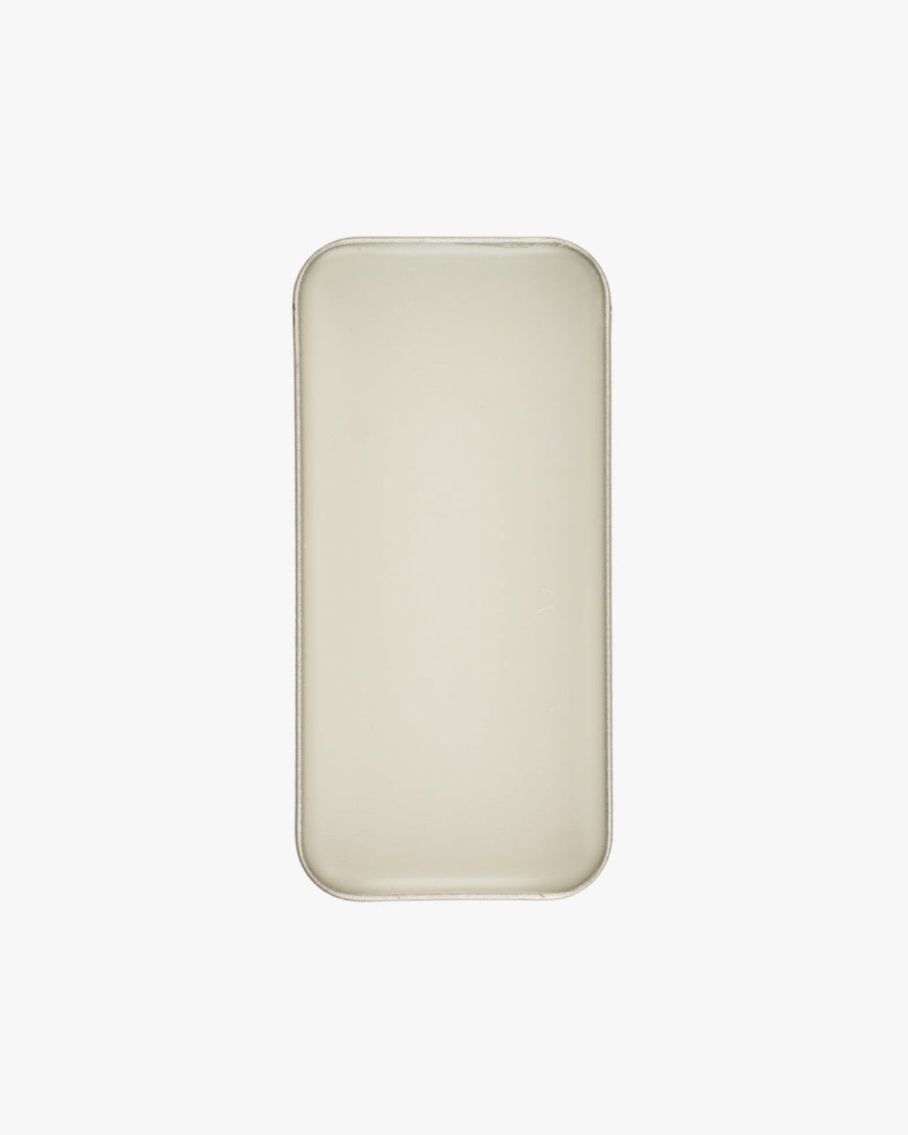 Seint Saved Salve open tin viewed from above, filled edge to edge with smooth ivory balm